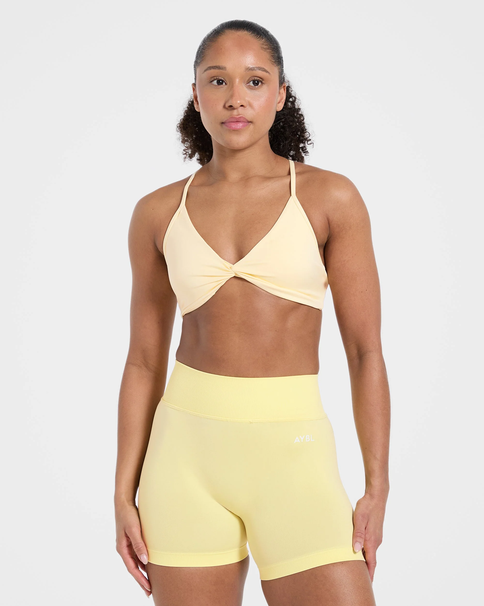 Essential Twist Crossback Sports Bra - Geel